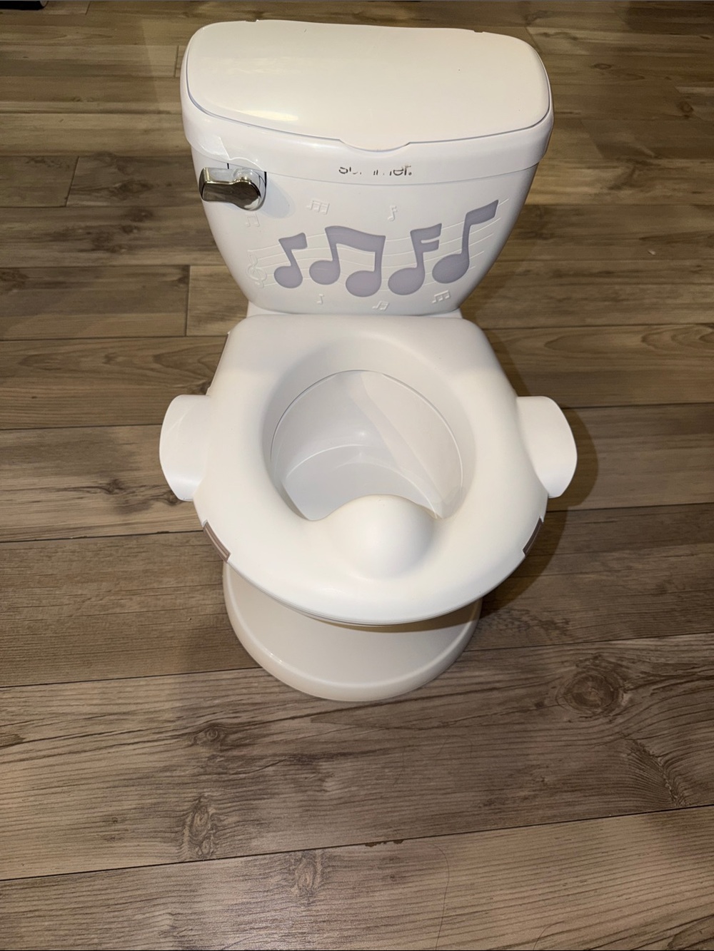 Only used for a week ..lights up and makes flushing noise